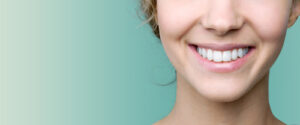 Woman with healthy guns and teeth in Mount Pleasant, Michigan