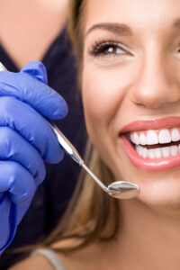 Woman with great smile after tooth-colored fillings in Mount Pleasant, MI
