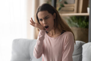Woman with tooth pain after a filling in Mount Pleasant